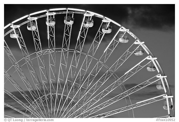 Detail of Ferris wheel at dusk, Tuileries. Paris, France