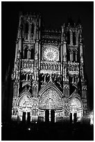 Cathedral facade laser-illuminated at night to recreate original colors, Amiens. France (black and white)
