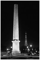 Luxor obelisk of the Concorde plaza and Eiffel Tower at night. Paris, France ( black and white)