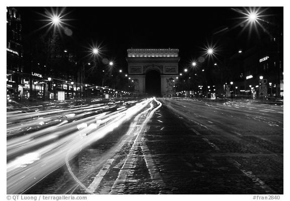 Arc de Triomphe and Champs Elysees at night. Paris, France (black and white)