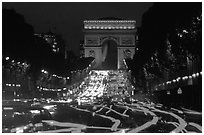Arc de Triomphe and Champs Elysees at night. Paris, France ( black and white)