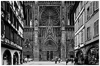 Facade of the Notre Dame cathedral seen from nearby street. Strasbourg, Alsace, France (black and white)