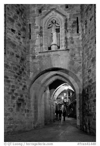 Porte Narbonaise gate by night. Carcassonne, France (black and white)