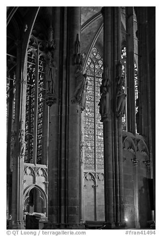 Columns, statues, and stained glass, basilique St-Nazaire. Carcassonne, France (black and white)
