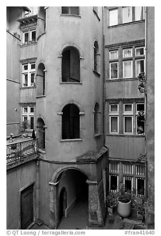 Base of the Tour Rose with traboule passageway. Lyon, France (black and white)