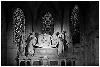 Lit sculpture of Christ laid to rest, St Trophime church. Arles, Provence, France (black and white)