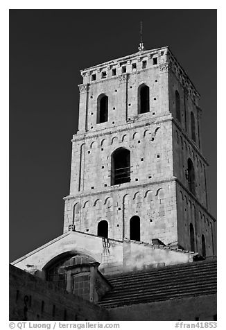 Bell tower in provencal romanesque style. Arles, Provence, France (black and white)