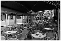 Cafe outdoor terrace, Cours Mirabeau. Aix-en-Provence, France (black and white)
