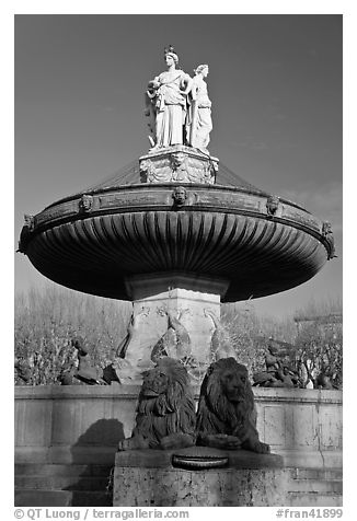 Monumental fountain with three statues representing art, justice and agriculture. Aix-en-Provence, France