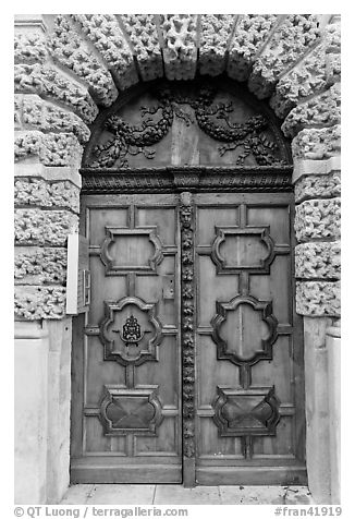 Decorated wooden door. Aix-en-Provence, France (black and white)