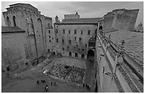 Honnor courtyard and walls from above, Palace of the Popes. Avignon, Provence, France ( black and white)