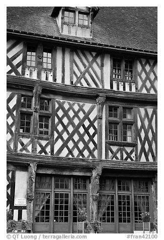 Facade of medieval half-timbered house, Chartres. France (black and white)