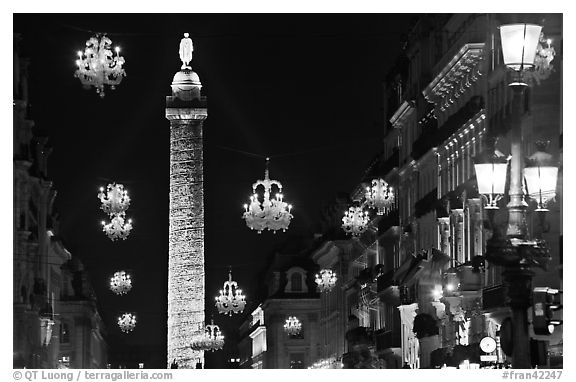 Christmas lights and Place Vendome column by night. Paris, France
