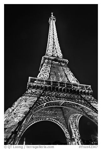Illuminated  Eiffel Tower seen from close. Paris, France (black and white)