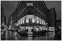 Hotel and pedestrian streets at night. Quartier Latin, Paris, France (black and white)
