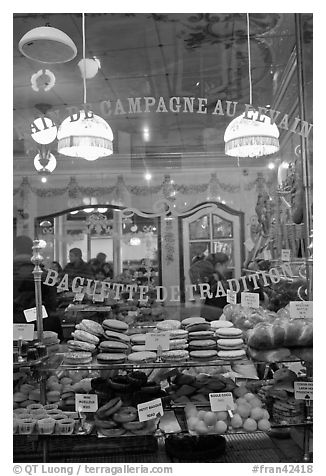 Pastries in bakery storefront. Paris, France (black and white)