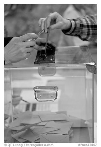Ballot box with hands. Paris, France (black and white)
