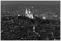 Montmartre Hill and Sacre-Coeur basilica at night. Paris, France (black and white)