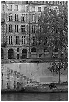 Quay and riverfront buildings on banks of the Seine. Paris, France (black and white)