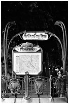 Embrace at the entrance of a metro station. Paris, France (black and white)