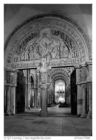 Sculpted Doors and tymphanum inside the Romanesque church of Vezelay. Burgundy, France (black and white)