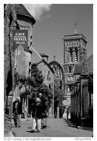 Main street of the Hill of Vezelay with the church in the background. Burgundy, France (black and white)