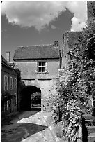 Street and old town gate, Vezelay. Burgundy, France ( black and white)