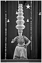 Rajasthani dancer balancing jars on head. New Delhi, India (black and white)