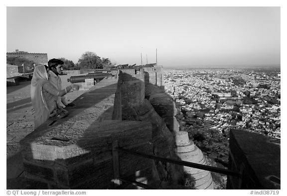 Couple looking at the view from Mehrangarh Fort. Jodhpur, Rajasthan, India (black and white)