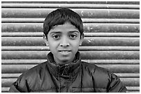 Boy with insulated jacket. Jodhpur, Rajasthan, India (black and white)