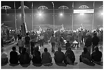 Worshipers attending arti ceremony at Ganga Seva Nidhi. Varanasi, Uttar Pradesh, India ( black and white)
