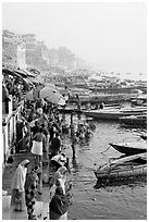 People and boats on the banks of the Ganges River, Dasaswamedh Ghat. Varanasi, Uttar Pradesh, India ( black and white)