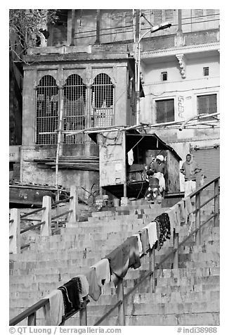 Laundry on hand-rail of ghat steps. Varanasi, Uttar Pradesh, India (black and white)