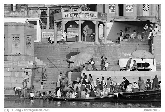 Boats loaded with pilgrims and steps, Manikarnika Ghat. Varanasi, Uttar Pradesh, India (black and white)