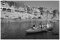 Rowboat in front of Scindhia Ghat. Varanasi, Uttar Pradesh, India ( black and white)