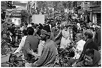Riders waiting in congested street. Varanasi, Uttar Pradesh, India ( black and white)