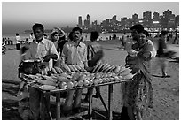 Corn stall at twilight, Chowpatty Beach. Mumbai, Maharashtra, India (black and white)