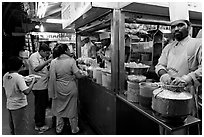 Panipuri stall, Chowpatty Beach. Mumbai, Maharashtra, India (black and white)