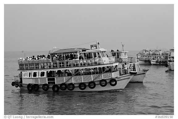 Tour boat at twilight. Mumbai, Maharashtra, India (black and white)