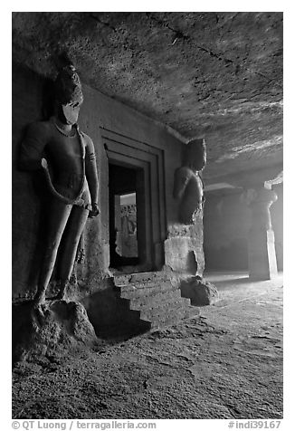 Figures of Dwarpala on Shiva shrine, Elephanta caves. Mumbai, Maharashtra, India