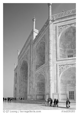 People strolling around main structure, Taj Mahal. Agra, Uttar Pradesh, India (black and white)