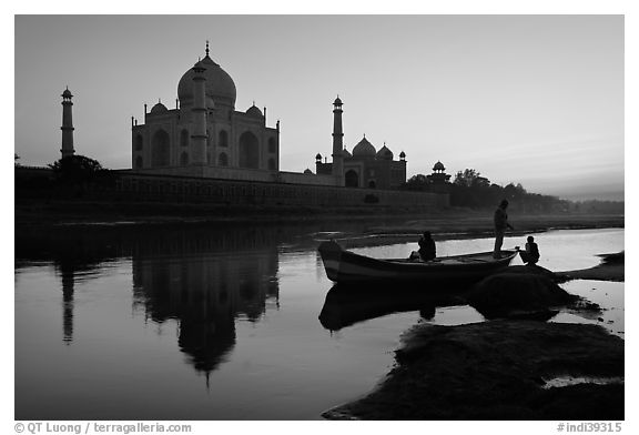 Boat on Yamuna River in front of Taj Mahal, sunset. Agra, Uttar Pradesh, India (black and white)