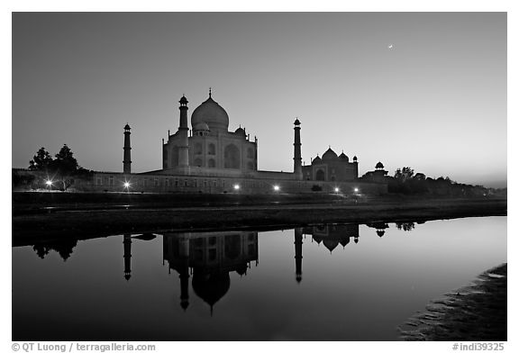 Taj Mahal complex reflected in Yamuna River at sunset. Agra, Uttar Pradesh, India
