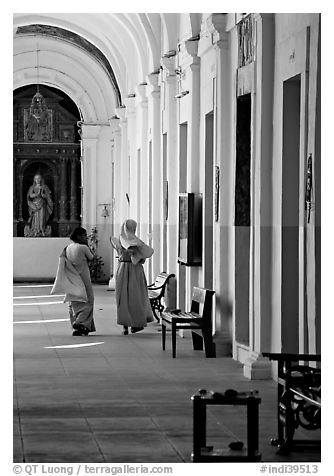 Woman and nun in Convent of St Monica , Old Goa. Goa, India (black and white)