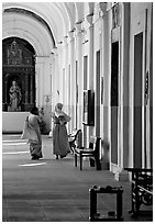 Woman and nun in Convent of St Monica , Old Goa. Goa, India ( black and white)