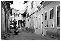 Street with painted houses, Panaji. Goa, India (black and white)