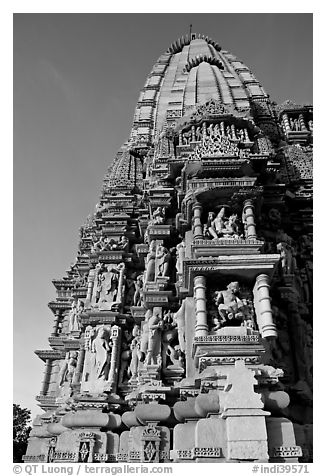Bands of carved sculptures below spire (sikhara), Javari Temple, Eastern Group. Khajuraho, Madhya Pradesh, India (black and white)