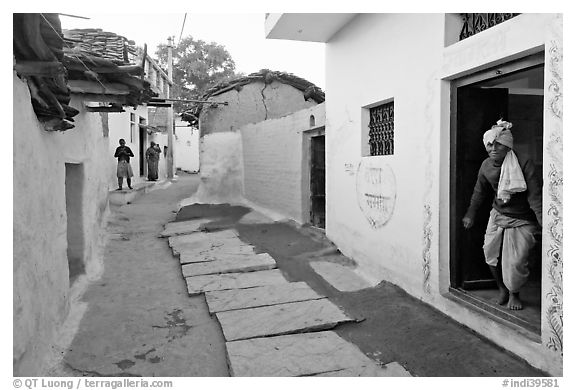 Alley in village. Khajuraho, Madhya Pradesh, India (black and white)
