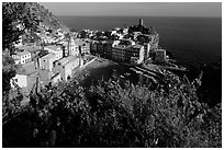 Harbor, church, 11th century castle and village, late afternoon, Vernazza. Cinque Terre, Liguria, Italy (black and white)