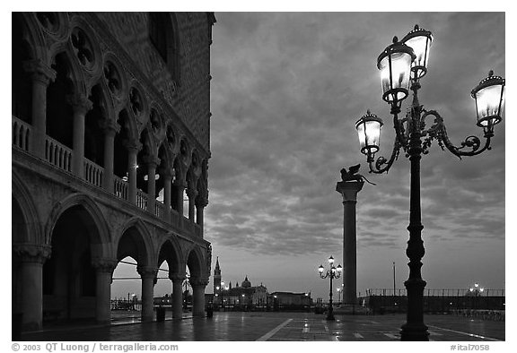 Lamp, column with Lion, Piazza San Marco (Square Saint Mark) at dawn. Venice, Veneto, Italy (black and white)